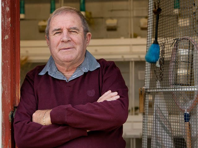 Finch Breeder And Drummer Outside Breeding Hut For Gouldian Finches