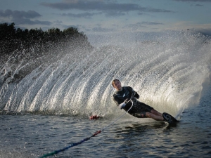 Water Skier On The Turn Kicking Up Spray