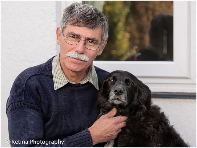 Pets As Therapy Coordinator With Collie Dog Outside In Garden