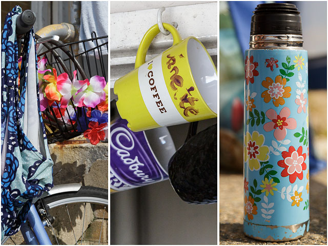Coffee Cup On Hook With Flowered Thermos Flask And Flowers In Bicycle Basket
