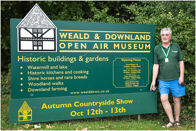 Weald And Downland Open Air Museum Entrance Sign With Volunteer Worker
