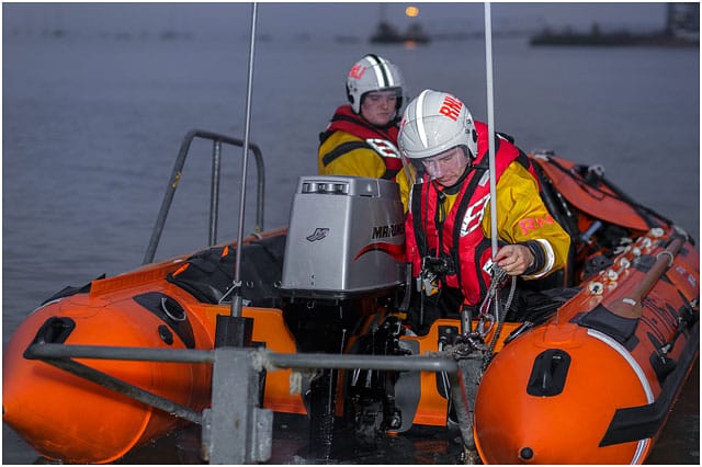 D Class RNLI Inshore Rescue Boat Launching At Night