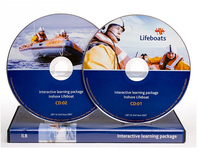 Two RNLI Interactive Learning Package CDs on Display Case