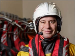 RNLI volunteer in survival kit and helmet