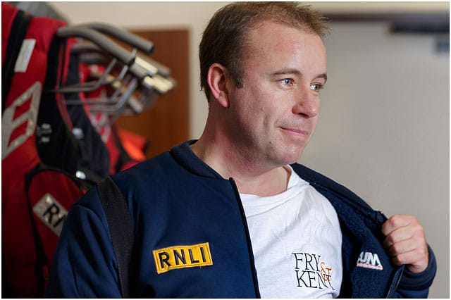 RNLI Volunteer Putting on Woolly Bear