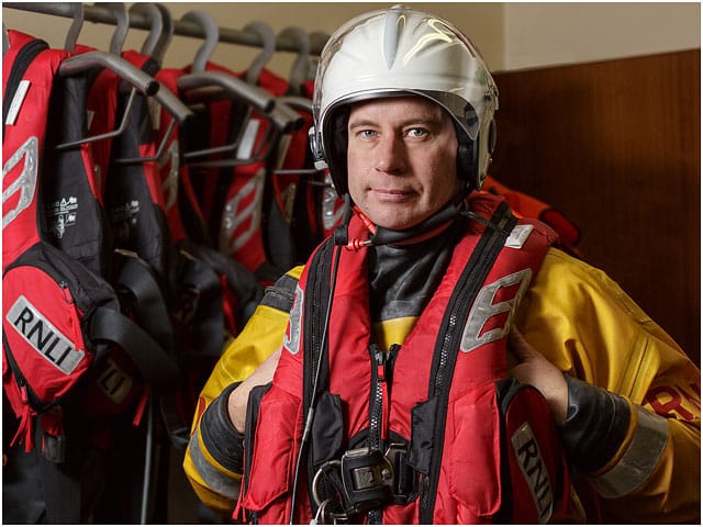 RNLI Volunteer Dressed In Survival Clothing And Equipment