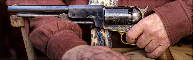 Close Up Of 1847 Colts Dragoon Revolver Held By Wild West Reenactment Player