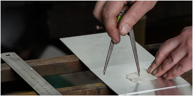 Measuring and marking up tinplate with a compass for blacksmiths design Designing And Measuring Tinplate With A Compass For Blacksmiths Design
