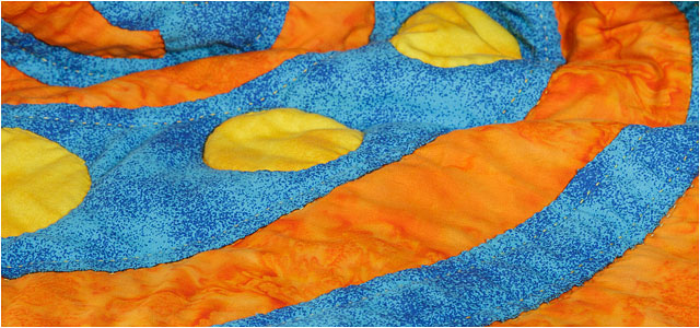 Blue Quilt With Reverse Applique Orange And Yellow Abstract Stitched Shapes 