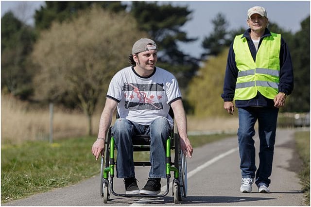 Brendan Williamson walking with son David at the beginning 