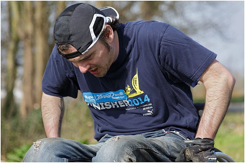 Digging deep for the last few yards of the Willow24 big wheelchair push at Lakeside