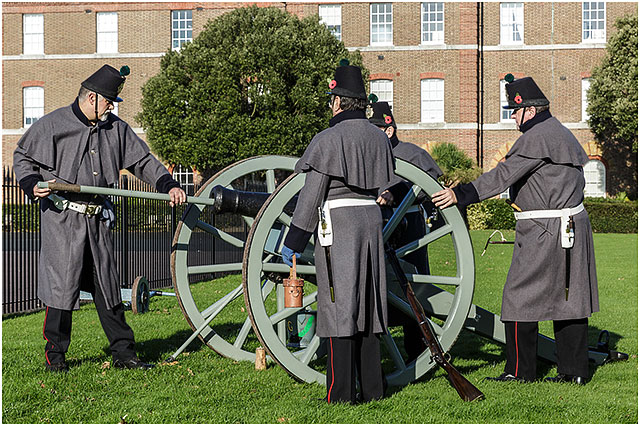 Priming Three Pounder Cannon For Firing at 2014 Remembrance Day Service 
