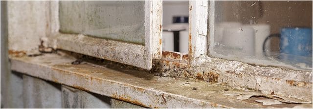 Close up of rusty metal window frame