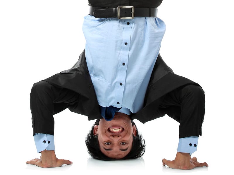 handstand-action Humorous example of studio headshot on white background