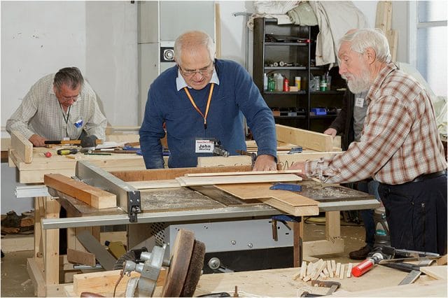 Three men in the shed