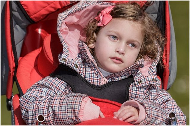 Portrait of Willow Scotney Williams in her pushchair 