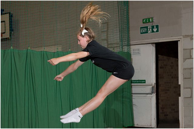 Individual cheerleader jump 