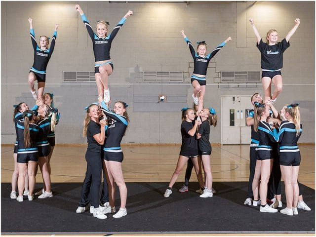 portsmouth warriors cheerleaders practising their pyramid routine 