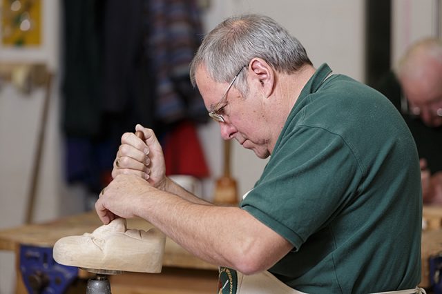 George palmer at work during a carve-in day at Portsmouth grammar school 