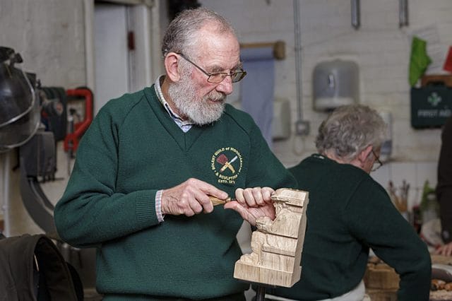 solent woodcarvers guild member at work 