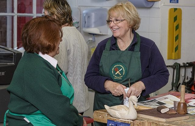 female woodcarvers during a carve-in workshop 