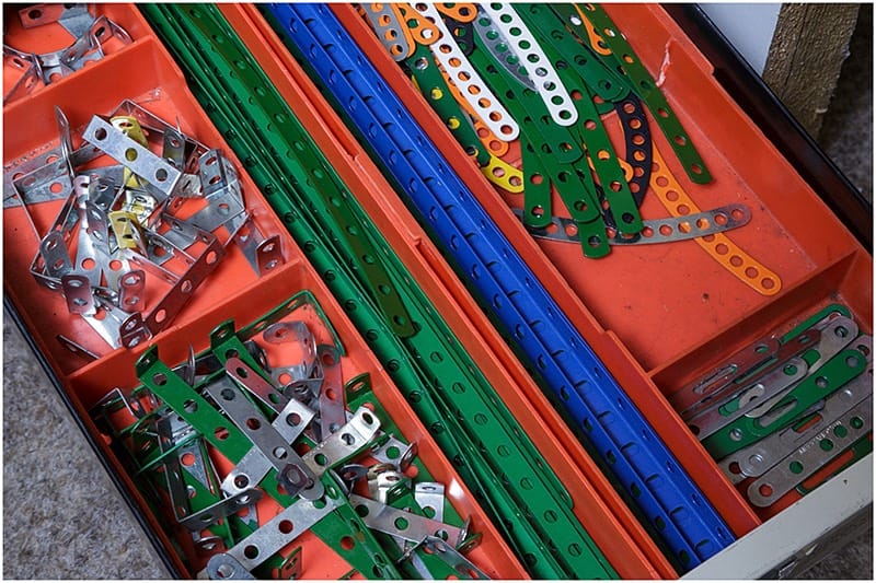 Different coloured Meccano parts