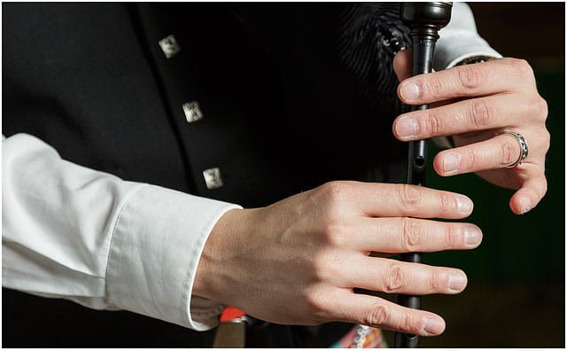 Demonstration of bagpipe chanter finger positions