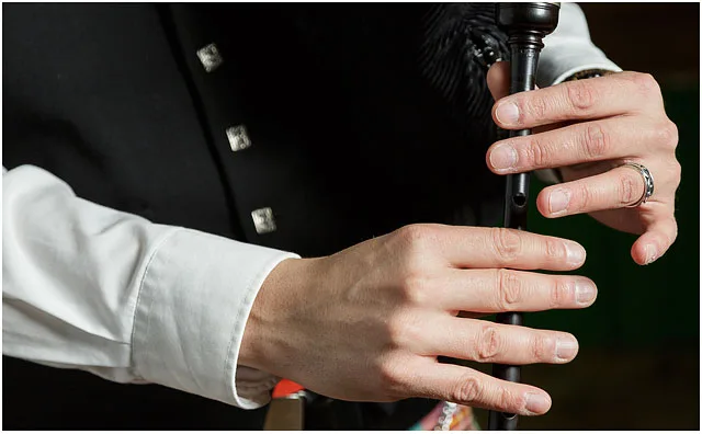 Demonstration of bagpipe chanter finger positions