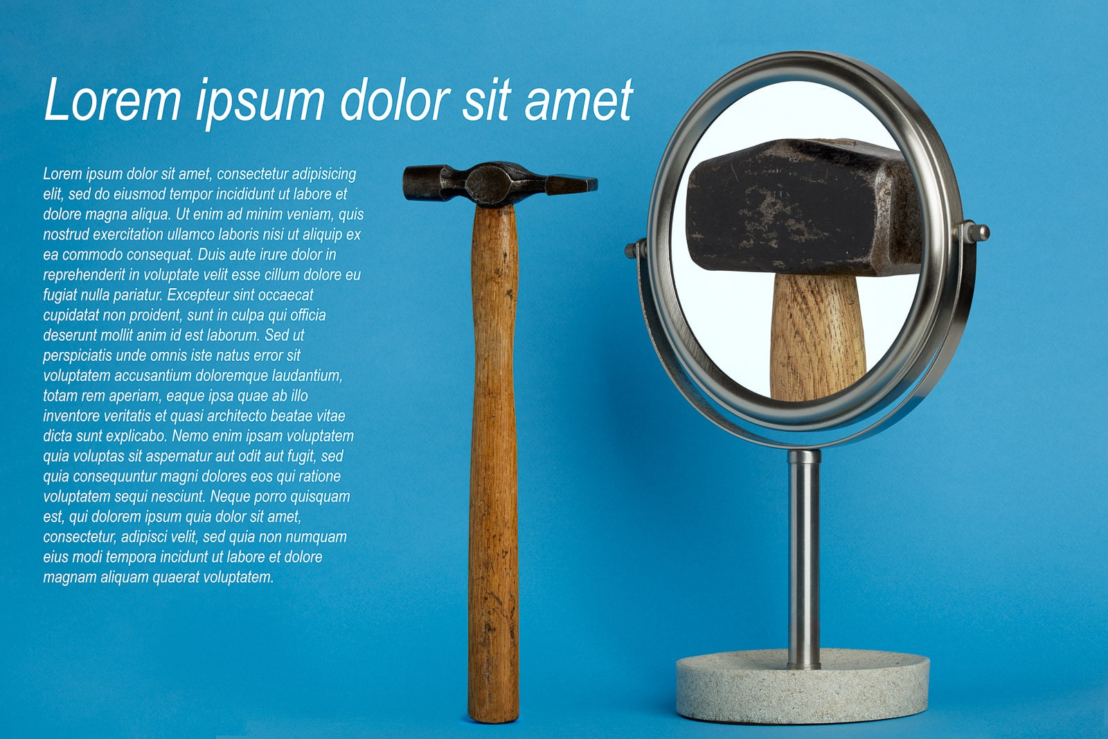 small pin hammer with lump hammer in small mirror on blue background with dummy text added