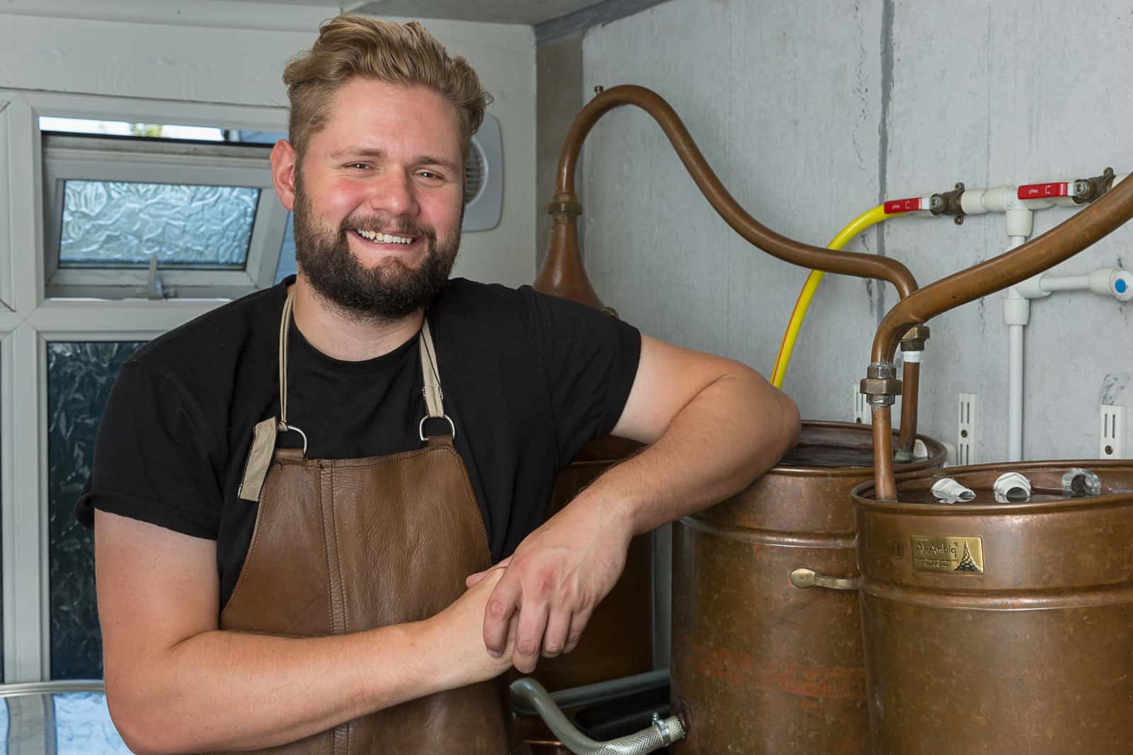 portrait of Tom Rudman founder and owner of corner fifty three distilling