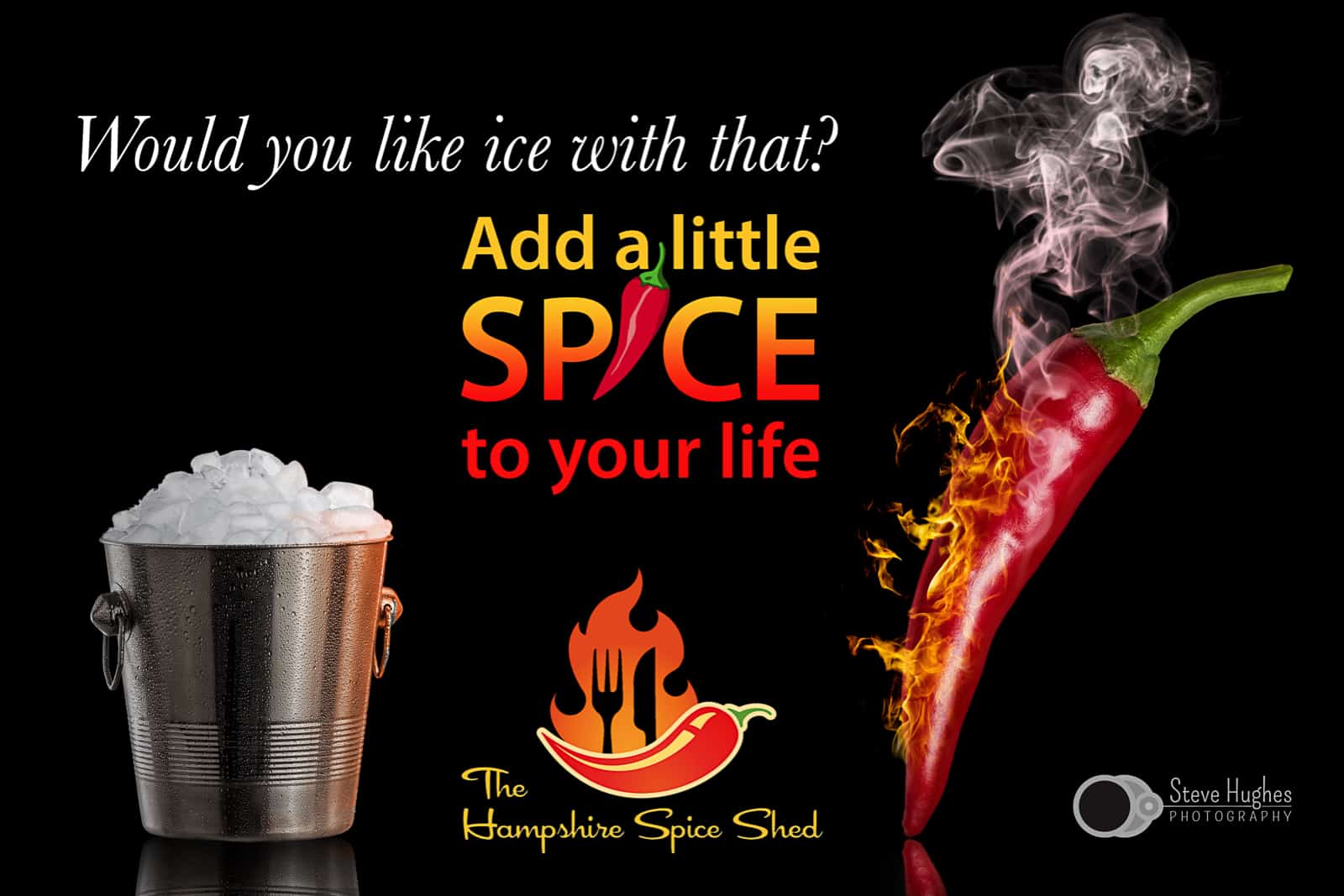 composite photograph of smoking red chillie pepper and silver ice bucket on black background