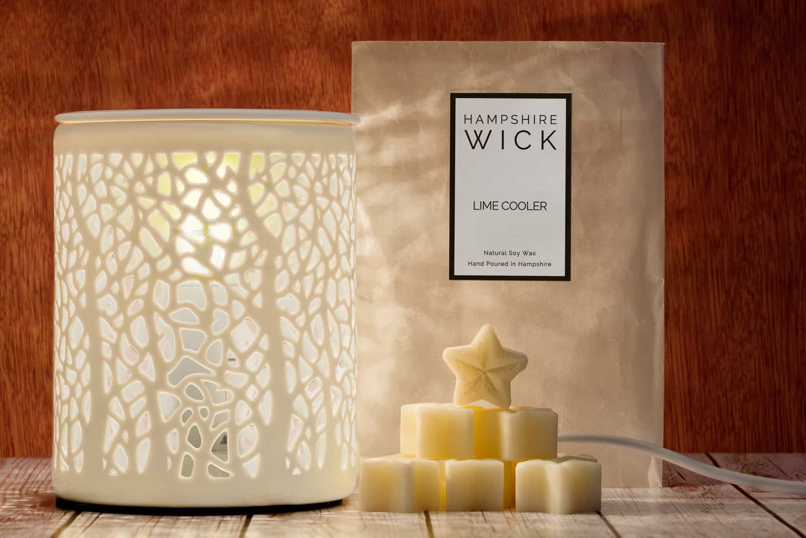 electic-oil-burner-switched-on Electric oil burner for candle wax melts at nighttime