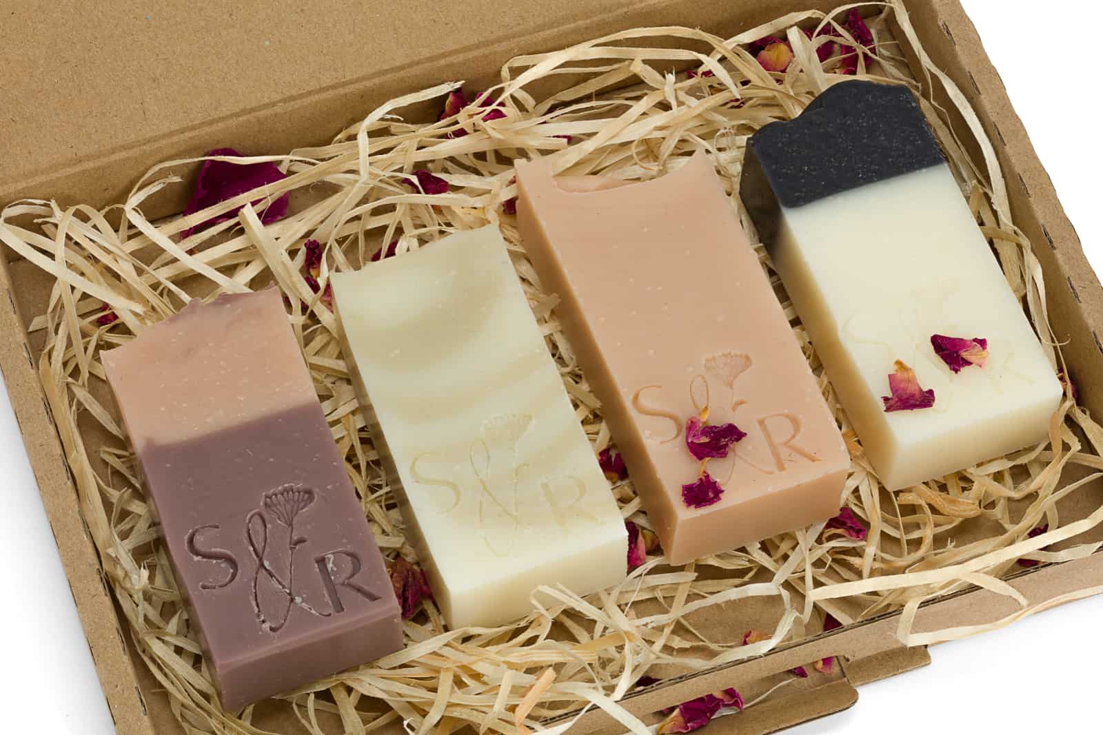 four mini soaps in a gift set