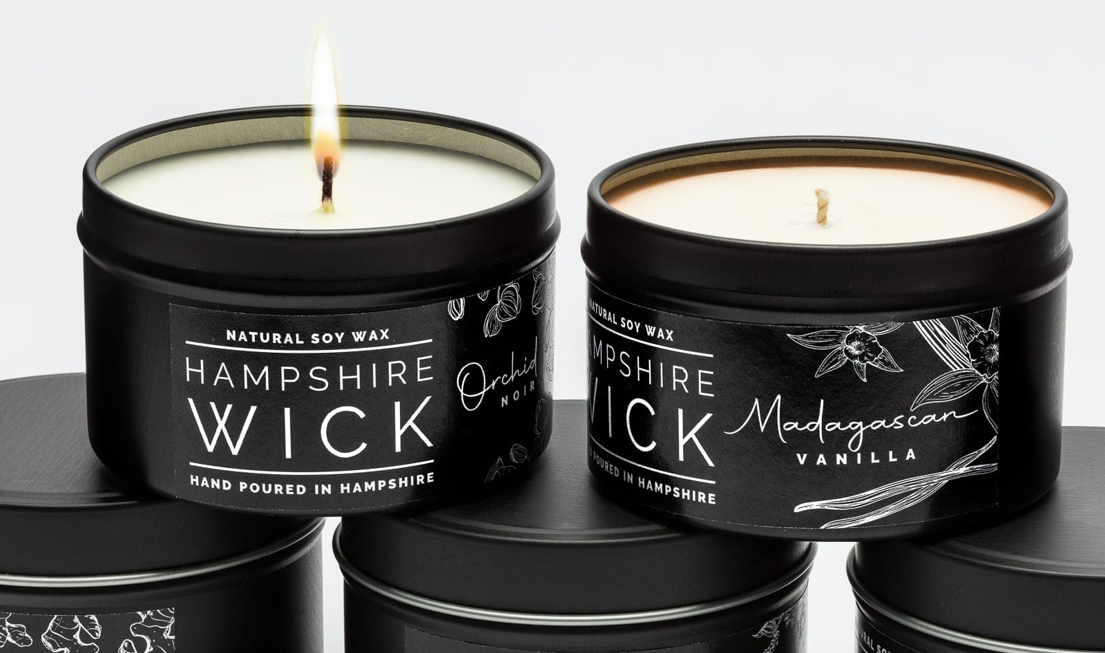 hampshire wick candle tins one of them alight