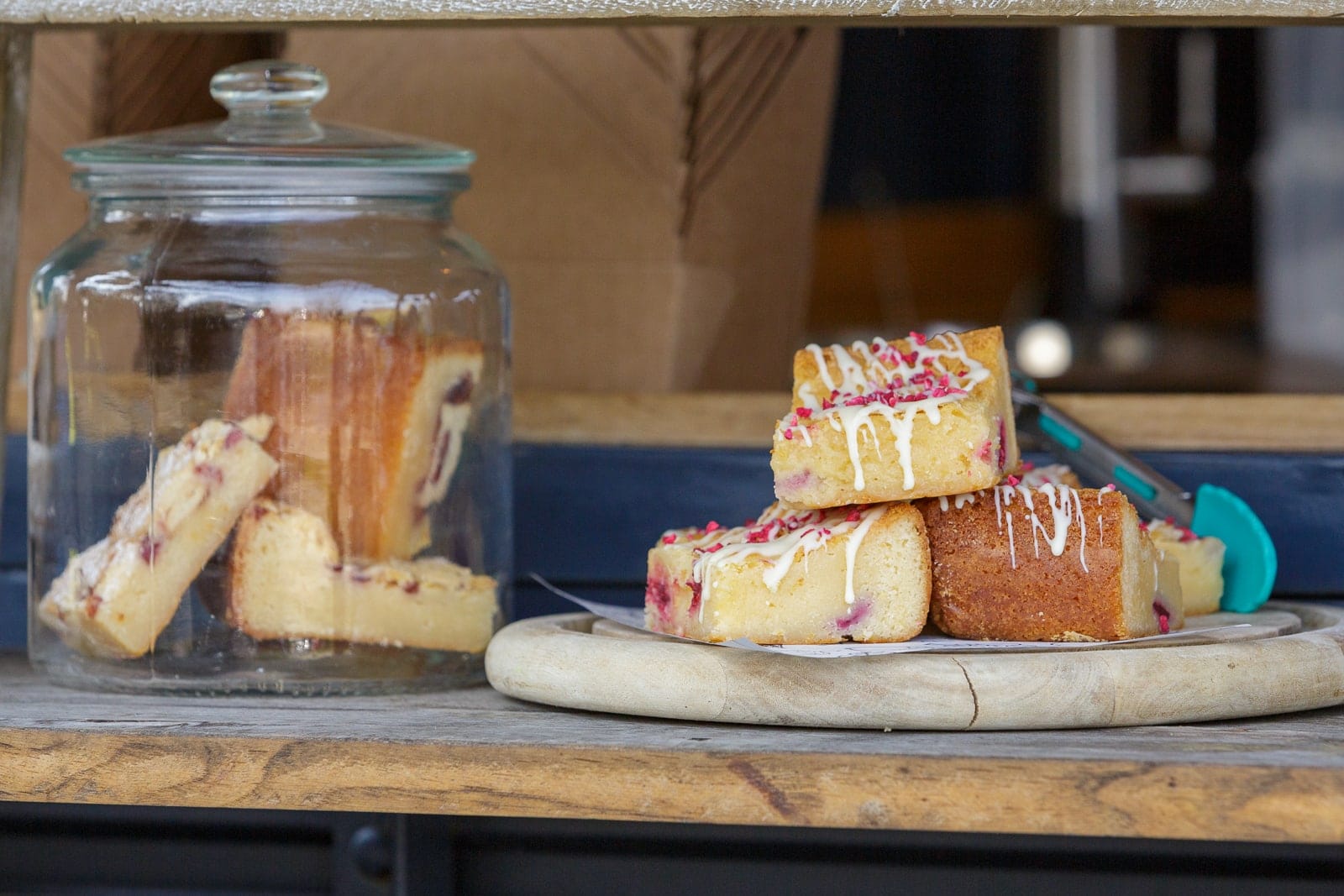 lemon blondie on wooden serving platter