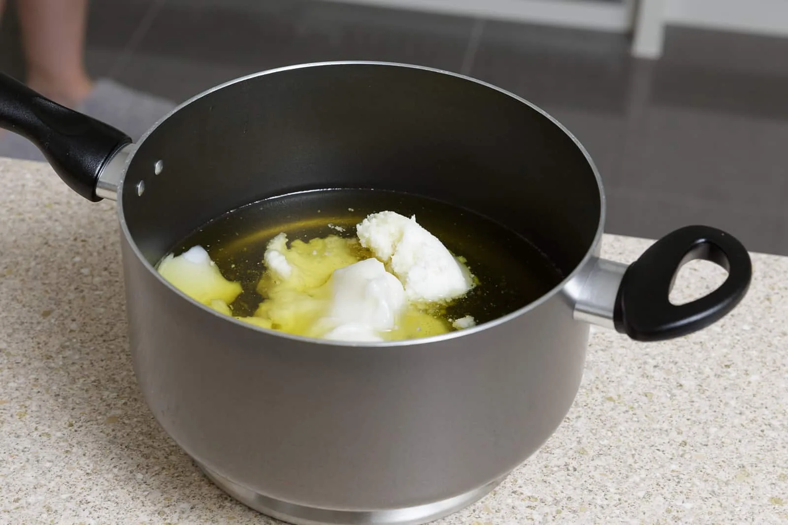 mixing-ingredients-in-saucepan mixing handmade soap ingredients