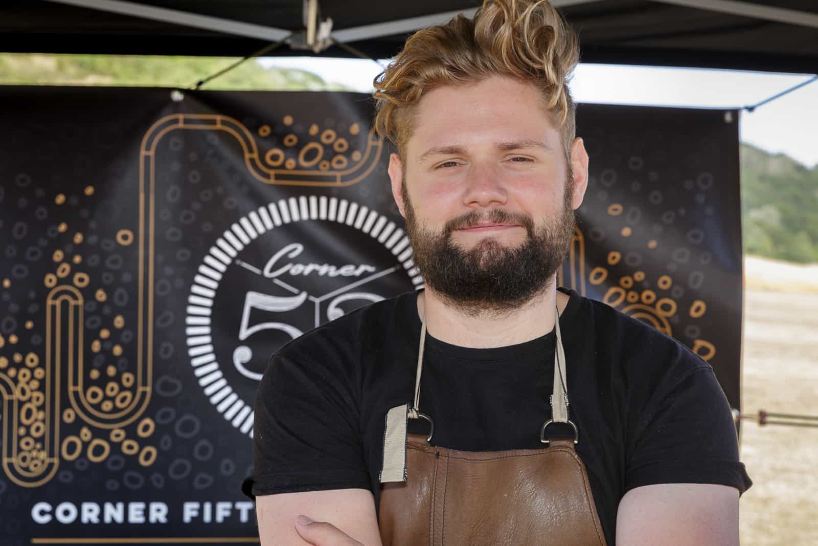 informal portrait of corner fifty three founder at their South Downs Craft Fair stall